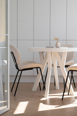 Minimalist Dining Area with Sunlit Elegance
