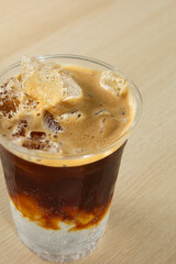 A view of an espresso tonic drink.