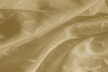 Smooth, elegant golden silk fabric with a flowing, shiny texture creates a luxurious backdrop