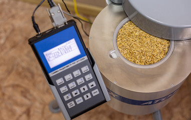 A bowl with grain is installed in a radiometer designed to measure the volumetric VA and specific...