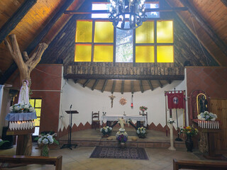 Interior of Rustic Chapel with Altar