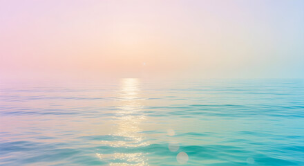 Soft pastel hues wash across the serene seascape at sunrise, creating a calming, dreamy atmosphere over the gentle turquoise waves.