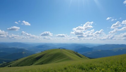 Stunning Panoramic View of Lush Green Mountain Meadow Under a Bright Blue Sky with Puffy Clouds