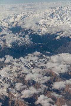 Landscape on the tops of the mountains of the Caucasus from an airplane elluminator