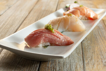 A view of a trio of seared nigiri.