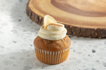 A closeup view of a banana cupcake.