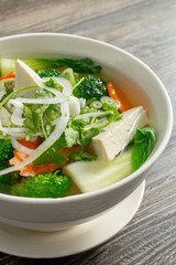 A view of a bowl of veggie pho.