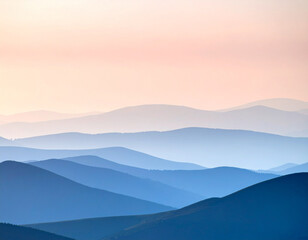 Obraz premium A serene landscape featuring layers of misty blue mountain ranges receding into the distance, under a soft, gradient pastel sky of pink and orange hues. Ideal for themes of nature, tranquility, or tra