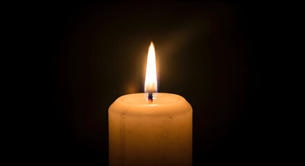Burning candle in the dark background
