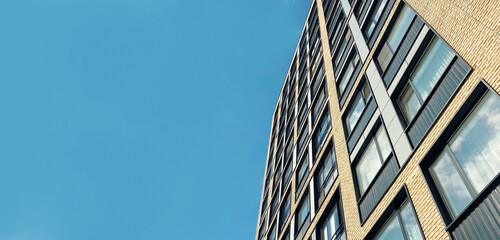 Architecture and real estate, modern residential apartment building with large panoramic windows