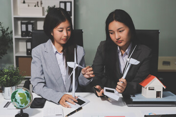 Business team people planning and discussing on recycle reduce reuse policy symbol in office meeting room.