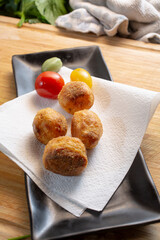 A view of polenta roasted potatoes on an appetizer plate.