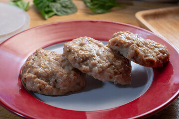 A view of a plate of chicken sausage.