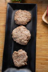 A top down view of a plate of chicken sausage.