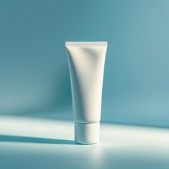 A white cosmetic tube, tilted slightly to the side, casting a soft shadow, on a light blue gradient background, studio setup for beauty branding, minimal and clean.