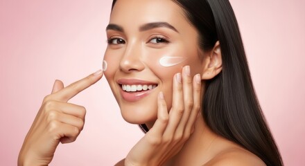 Woman applying glowing face cream for healthy skin