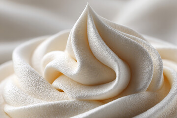 Macro shot of a swirled topping, meticulously piped into delicate, creamy peaks. The creamy, soft texture is emphasized in the soft lighting.