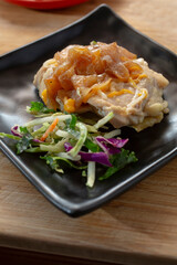 A view of a French onion chicken entree.