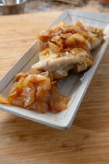 A view of a French onion chicken entree.