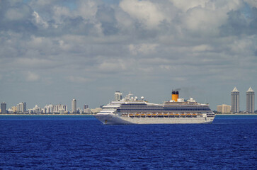Modern cruiseships cruise ship liners Magica, Seaside, Armonia and Fortuna anchored offshore of...