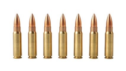 Shiny brass and copper rifle bullets on a white background