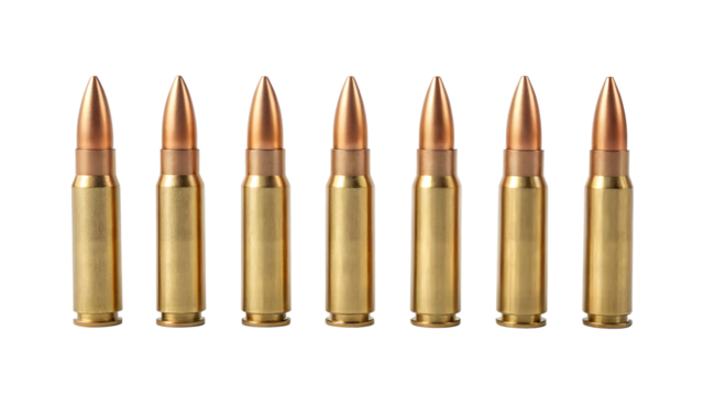 Shiny brass and copper rifle bullets on a white background