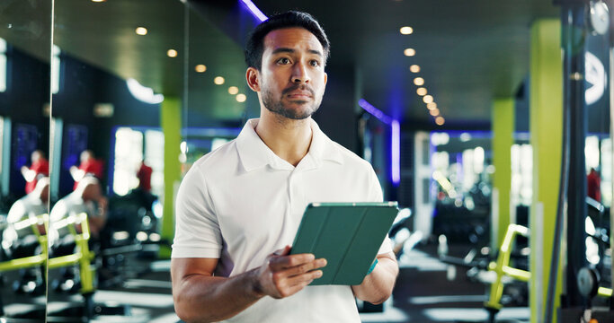 Manager, tablet and thinking with man in gym for membership application, planning or sign up schedule. Idea, tech and vision with health club owner in training facility for exercise or fitness