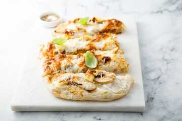 Pizza with pears and truffle