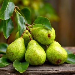 A close-up shot of fresh pears sitting on a wooden surface with leaves in the background. The pears are a vibrant green color and appear ripe and juicy