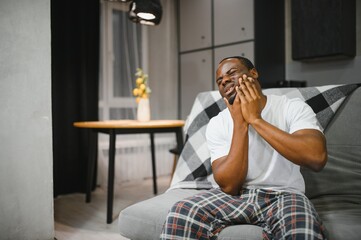 Portrait of African Man having Toothache, Tooth infection