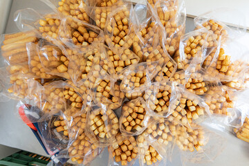 Bread sticks top view packed and ready to be delivered.Concept of artisanal bakery