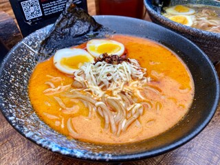Ramen, Japan, captured on July 4, 2025. A hearty bowl of Japanese noodle soup with rich broth,...