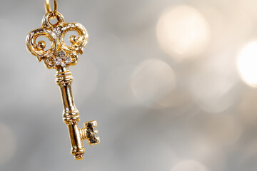 floating golden key in a digital background