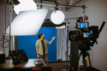 Film set, monitors and modern shooting equipment. Film crew, lighting devices, monitors, playbacks...