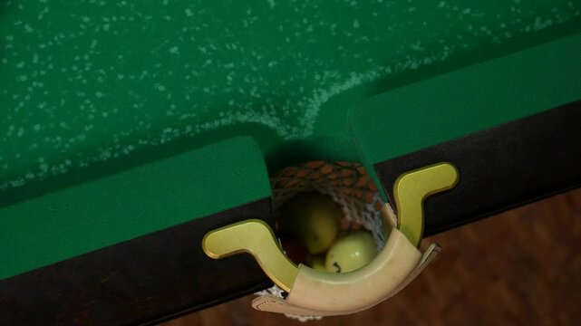 Billiards game, pool table, cue hammers the ball into the hole, snookers game process