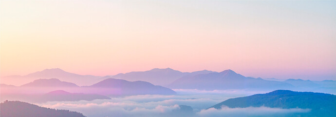 Pink and orange sunset over mountain range. Colorful panoramic illustration in pastel shades