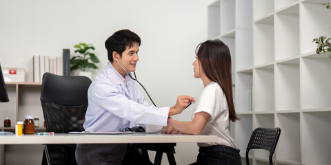 Health Checkup. Doctor using stethoscope for patient examination.