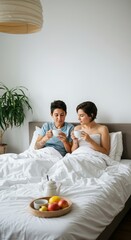 Lesbian couple enjoying breakfast with coffee in bed, in a plant-filled living room, relaxing and authentic