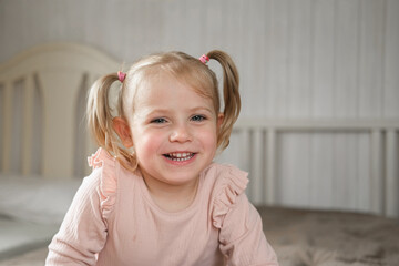 Little Girl joking sticking tongue out with silly expression. Child making face. Funny foolishness...