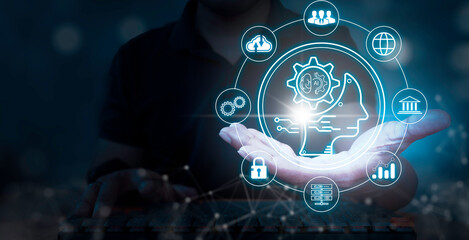 Businessman showing Ai technology on palm dark background. Artificial intelligence concept.