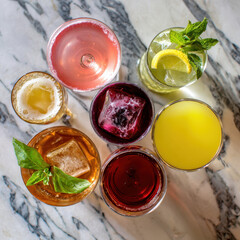 Top-Down View of Assorted Cocktails in Various Glasses
