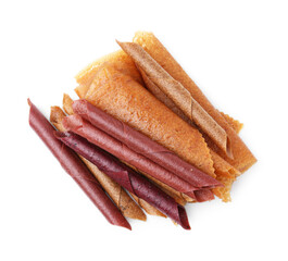 Delicious fruit leather rolls isolated on white, top view
