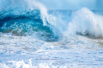 Heavy surf launches seawater skyward through Hawaii’s Halona Blowhole, capturing nature’s force...