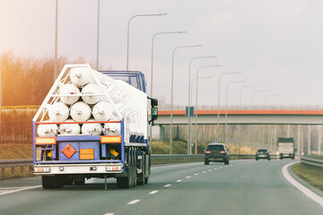 Hazardous material transport truck in motion