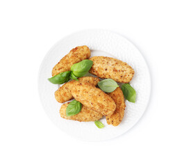Tasty fried croquettes and basil isolated on white, top view