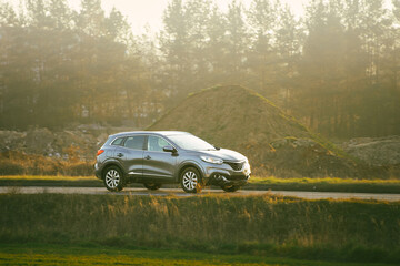 Car driving on scenic road
