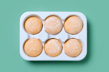 Japanese Mango ice cream mochi on green background. Top view