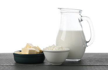 Different dairy products on grey wooden table against white background