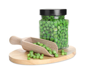 Fresh green peas in pickling jar and scoop isolated on white