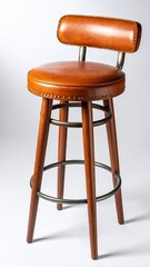 Caramel Leather Barstool with Patina Accents and Wooden Frame Isolated Against White Background